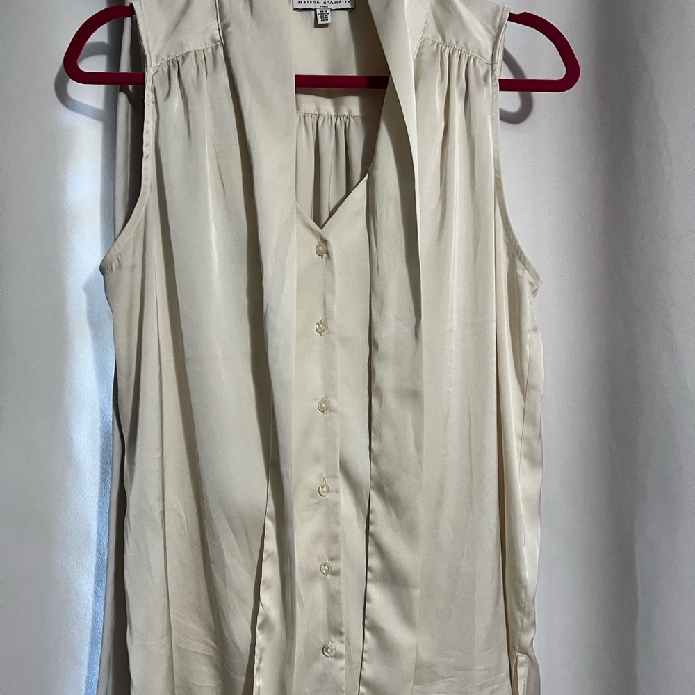 Chic Cream Sleeveless Blouse